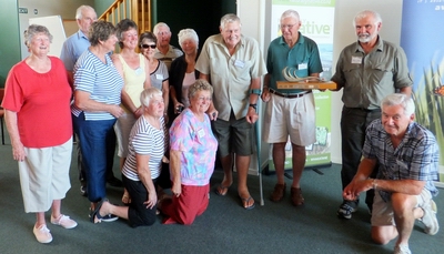 Taipa Beach Improvement Society members receive the annual 'Best Coastal Dune Restoration Project Award' from Dune Restoration Trust of New Zealand chairman Mark Dean, second from right.